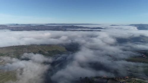 Flying in Sunrise Clouds The Clouds are Moving on Camera Aerial Drone View