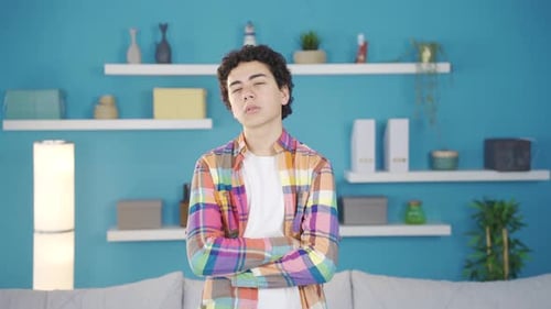 Thoughtful Young Man Pondering Indoors