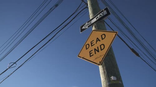 Handheld shot of a dead end sign in Brooklyn