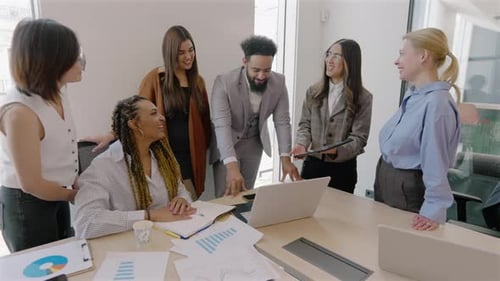 In a Modern Office Diverse Professionals Collaborate Effectively to Achieve Goals and Innovate