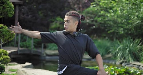 Healthy African American Man Exercising Ar Park Outdoor Practicing Yoga