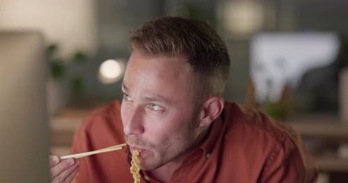 Businessman, night and eating Chinese food on break, rest or supper on computer at office