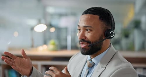 Businessman, call center and consulting in customer service, support or telemarketing at office