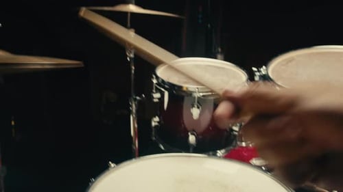 Expressive Drummer Young Man Professionally Playing on Dums in Studio Room Closeup Rock Metall Music