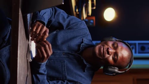 Vertical Video Content Creator Using Outlined Ideas on Notebook to Film Vlog Channel Intro