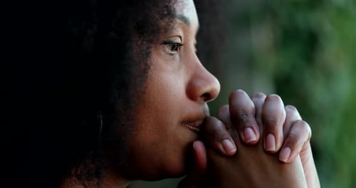 Thoughtful Woman Contemplating in Nature Setting