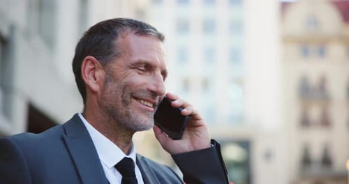 Phone call, contact and mature businessman in city with communication, negotiation or networking