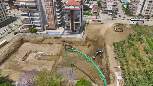 Aerial View Initial Phase Heavy Equipment and Concrete Work