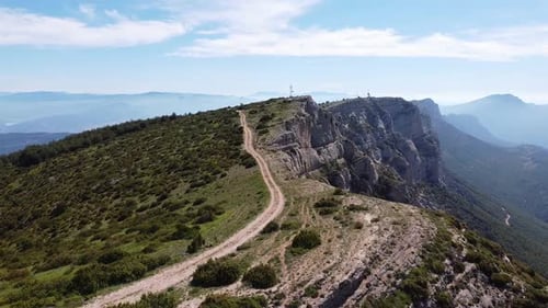 Ager, Lerida, Catalonia, Spain - Aerial Drone View at the Top of the Mountain Range with Beautiful V