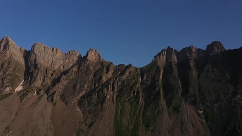 Stunning Mountain Range Painted with Vibrant Sunrise Colors at Dawn