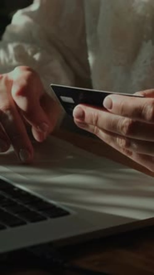 Vertical Video Woman Enters Her Bank Card Details to Make Online Payment