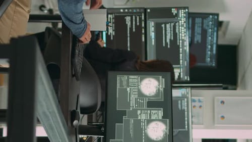 Vertical Video Asian Programer Focused on Writing Code Encounters Unexpected Compiling Error