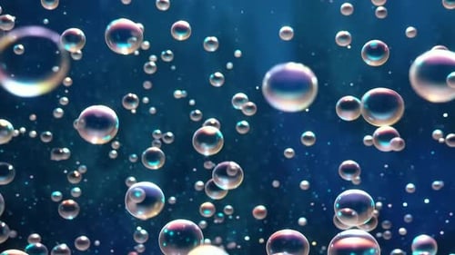 Iridescent Bubbles Rising Under Blue Water Background