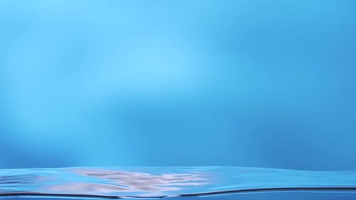 Wave Motion of Smooth Water Surface on Blue Background