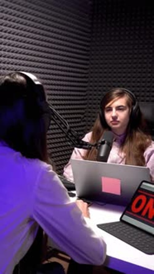 Recording Interview Podcast in Acoustic Studio of Young Female