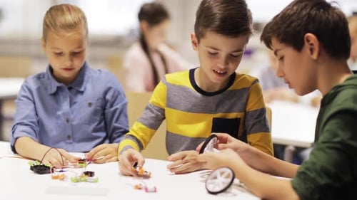 Children Construct Robotics Projects Together in Classroom