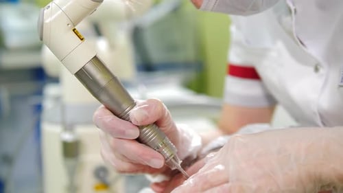 Male Patient Getting Laser Complexion Cleaning in Modern Spa Center Facial Skin Care and Treatment