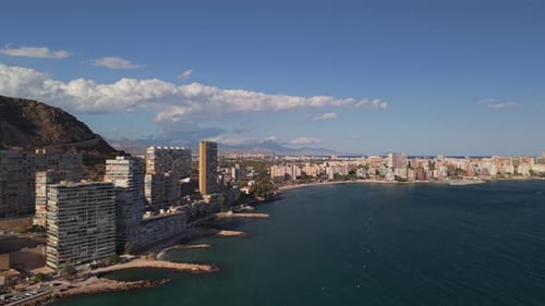 Aerial view of waterfront city and coastline