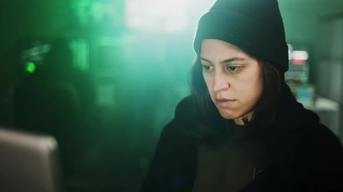 Focused Young Adult Working on Computer