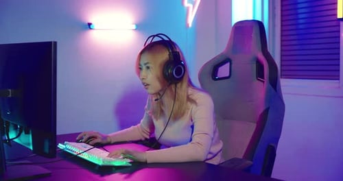 Female Gamer Wins While Playing Video Game