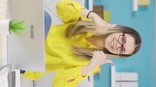 Smiling Woman Working with Laptop at Home