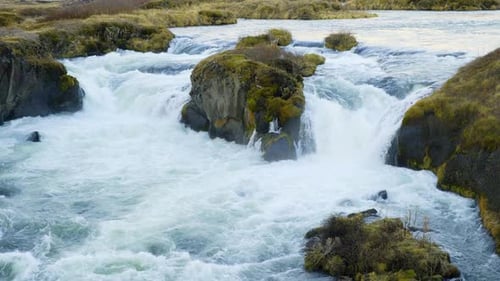 Waterfall at Sunrise Mountain Glacier River in Iceland Beautiful Pure Nature Landscape