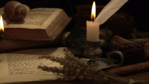 Studying at night by candlelight