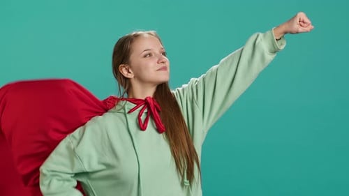 Portrait of Jolly Girl Wearing Superhero Costume for Halloween
