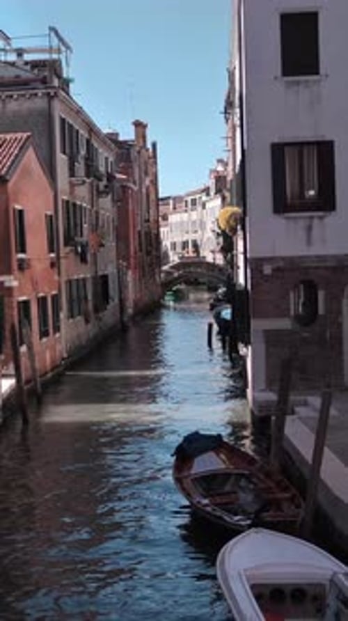 Vertical of Empty Little Canal in Venice