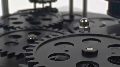 Black Gears Turning in a Cog System