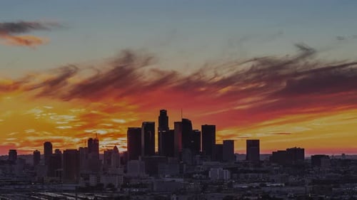 Time-lapse - Amazing sunset clouds over Los Angeles Downtown skyline