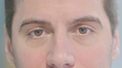 Close Up of Male Eyes Looking at Camera