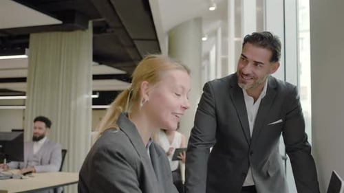 Business Professionals Collaborate at Modern Workplace