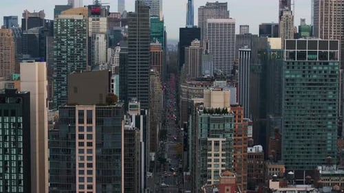 Aerial View of a Busy New York City Street with Yellow Taxi Cabs Driving Along the Avenue Modern