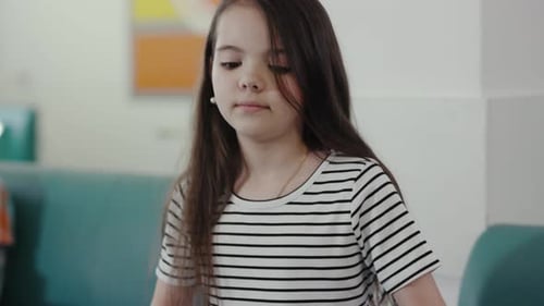 A Child Happily Enjoying Their Healthy School Lunch Served on a Tray at the Dining Table
