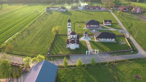 Flying around the church in small village with Mavic 2 Pro. Beautiful surrounding area . Stunning gr