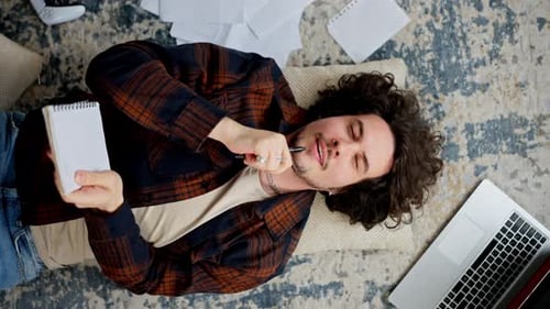 Young Adult Thinking and Writing on Rug