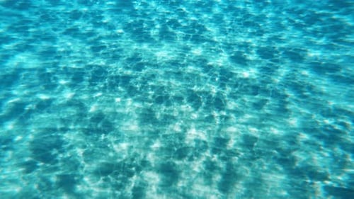 Underwater Light Background on the Sea Floor