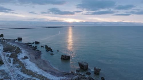 Beautiful aerial establishing view of Karosta (Liepaja) concrete coast fortification ruins, vibrant