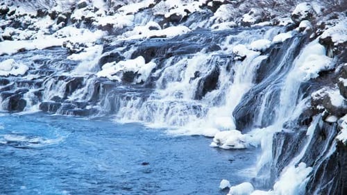 Waterfall in Iceland Snowy Mountain and Cold River in Winter Magical Outdoor Winter Time Location