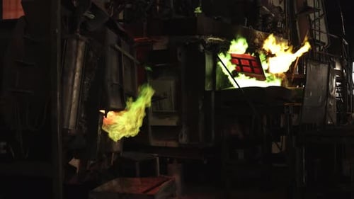 Molten Metal Processing in Dark Industrial Factory