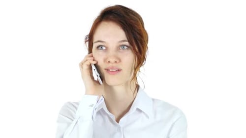 Woman Talking on Cell Phone in Studio