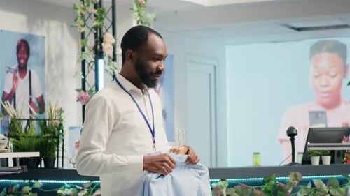 Man Restocks Luxurious Clothing Store