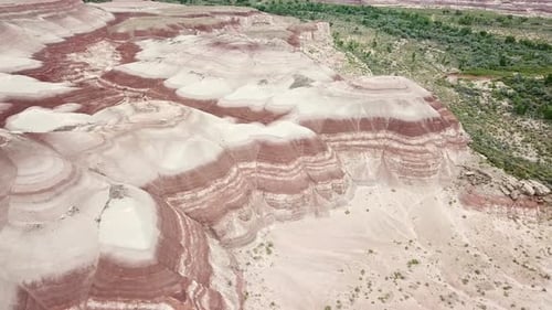 Aerial View on Layered Rock Hills in Utah Desert. Strange Eroded Sandstone Formations Near Hanksvill