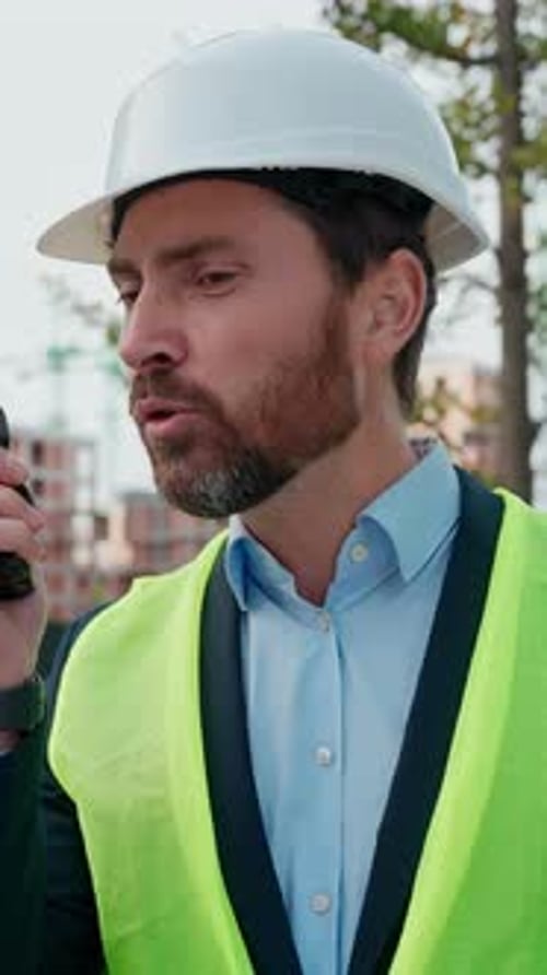 Caucasian Annoyed Man in Hardhat Engineer Shouting Walkie Talkie Trouble Build Aggressive Worker
