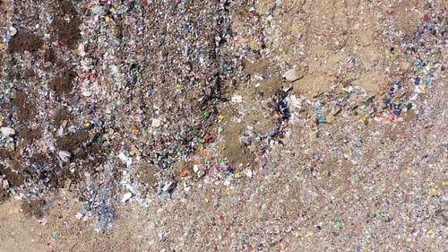 Compacting trash at a local landfill, Aerial view