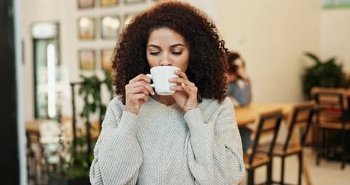 Woman, relax and smile with drinking coffee in cafe for break, satisfaction and peace on weekend