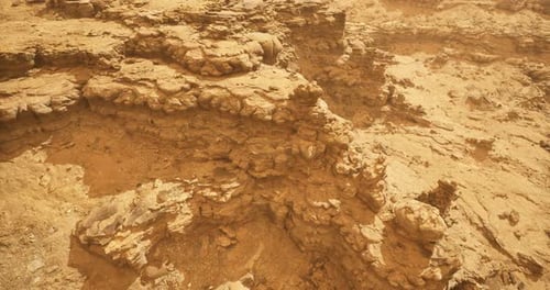 Unique Rocky Formations Displayed Within a Vast Desert Landscape