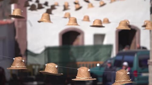 Hats hunging at the streets of Tejeda town in Gran Canaria, Spain for traditional decoration