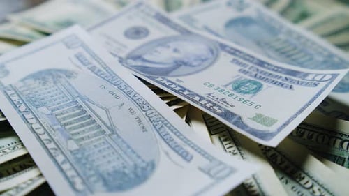 American Hundred Dollar Banknotes Rotating Slowly Background